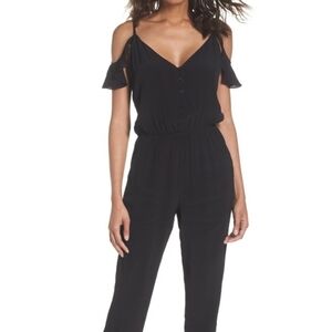 Fraiche by J Ruffle Cold Shoulder Jumpsuit Black Ruffle Pants Size Medium NWT
